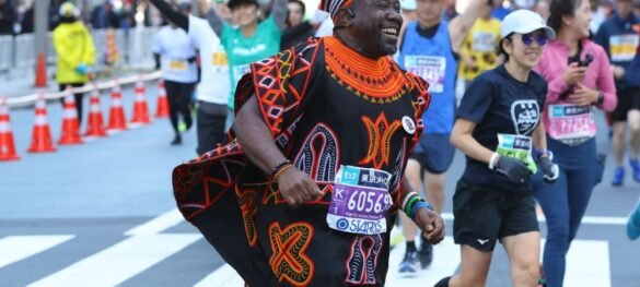 With a smile, the Toghu Marathoner conquers around the world, to showcase his culture, and raise funds for community initiatives close to his heart