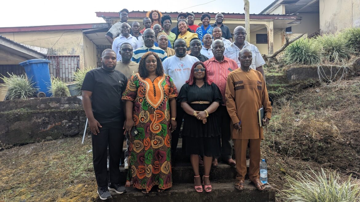 Health Officials, Journalists and Inspectors pose for a family picture