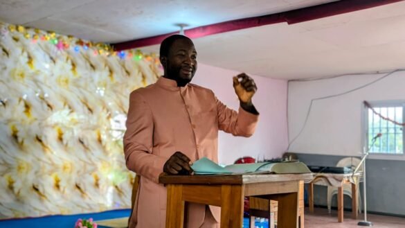 Pastor Moses, speaking to the press in Buea