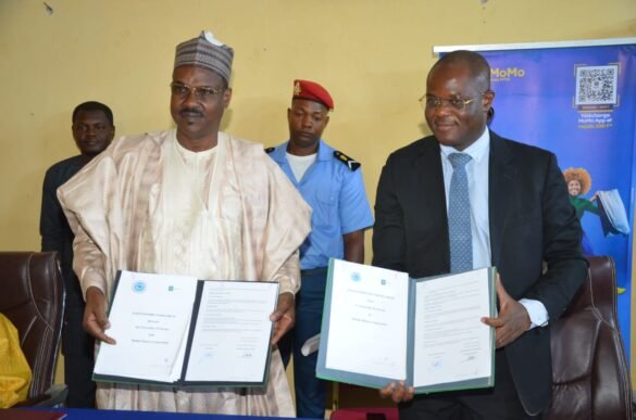 Prof Boubakari Oumarou, Rector of Garoua University and Alain Claude Nono, CEO of Mobile Money Corporation